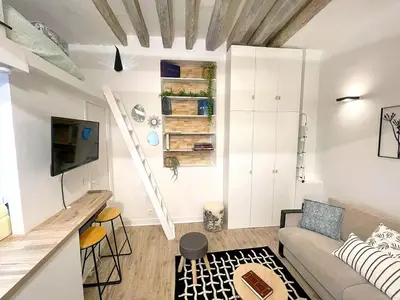 Un ou plusieurs lits dans un hébergement de l'établissement Loft Augustins