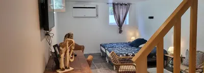 Coin salon dans l'établissement Grande OU petite maison sur 360m2 de jardin clos sans vis à vis
