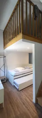 Un ou plusieurs lits dans un hébergement de l'établissement Grande OU petite maison sur 360m2 de jardin clos sans vis à vis