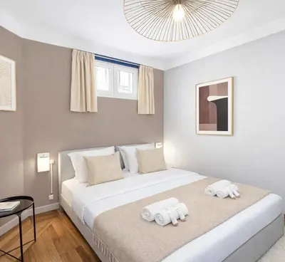 Un ou plusieurs lits dans un hébergement de l'établissement Montparnasse - Deluxe apartment with lift for 5