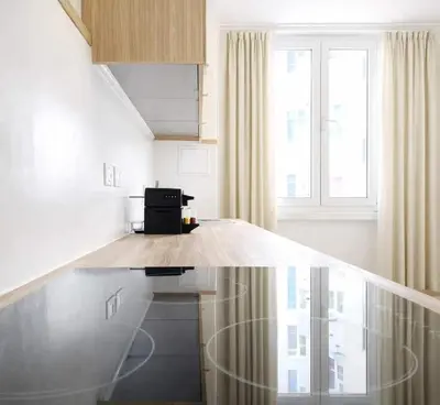 Cuisine ou kitchenette dans l'établissement Montparnasse - Deluxe apartment with lift for 5