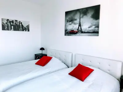 Un ou plusieurs lits dans un hébergement de l'établissement EIFFEL TOWER PENTHOUSE