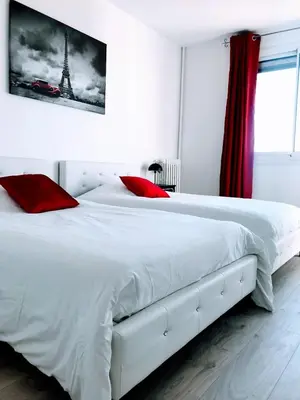 Un ou plusieurs lits dans un hébergement de l'établissement EIFFEL TOWER PENTHOUSE