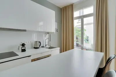 Cuisine ou kitchenette dans l'établissement Charmant studio au coeur de Paris pour 2 personnes by Weekome