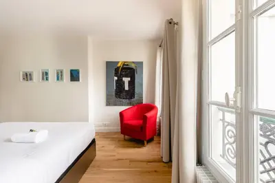 Un ou plusieurs lits dans un hébergement de l'établissement GuestReady - Estadia tranquila em Le Marais