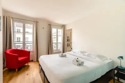 Un ou plusieurs lits dans un hébergement de l'établissement GuestReady - Estadia tranquila em Le Marais