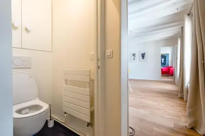 Un ou plusieurs lits dans un hébergement de l'établissement GuestReady - Estadia tranquila em Le Marais