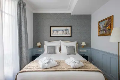 Un ou plusieurs lits dans un hébergement de l'établissement LE BEAU MARAIS - Luxury Apartments, AIR COND, LIFT