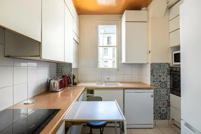 Cuisine ou kitchenette dans l'établissement Veeve - Plumes in the Park