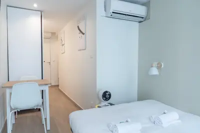 Un ou plusieurs lits dans un hébergement de l'établissement Lavie Maison Paris AC Retreat