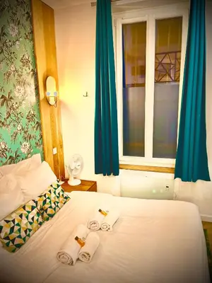 Un ou plusieurs lits dans un hébergement de l'établissement Appartement élégant - 2 chambres - 2 salles de bain