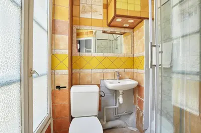 Salle de bains dans l'établissement Le Petit Borda