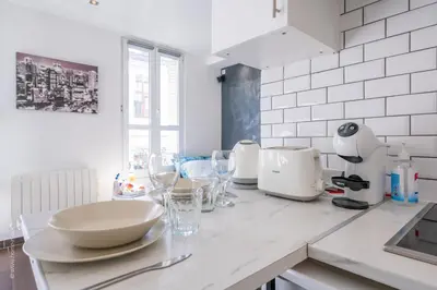 Cuisine ou kitchenette dans l'établissement Ma Douceur Paris La Défense