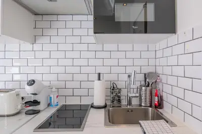 Cuisine ou kitchenette dans l'établissement Ma Douceur Paris La Défense