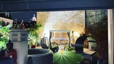 Coin salon dans l'établissement LUXURY FLAT WITH PRIVATE ROOFTOP - Paris 18