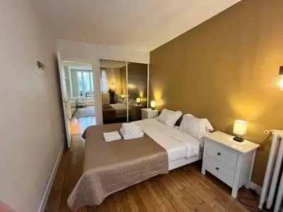 Un ou plusieurs lits dans un hébergement de l'établissement Superbe Appartement 2P PARIS Boulogne Roland Garros