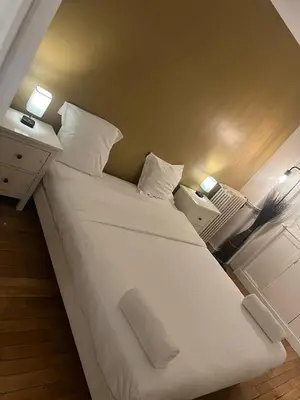 Un ou plusieurs lits dans un hébergement de l'établissement Superbe Appartement 2P PARIS Boulogne Roland Garros