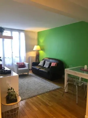 Coin salon dans l'établissement Superbe Appartement 2P PARIS Boulogne Roland Garros