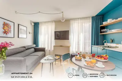 Télévision ou salle de divertissement dans l'établissement Beauquartier - Montorgueil