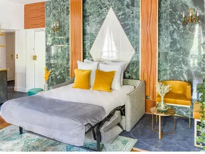 Un ou plusieurs lits dans un hébergement de l'établissement Merveil - Luxury Suite - Marais - Antoine II