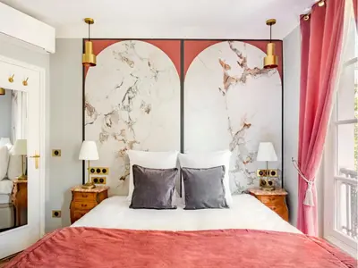 Un ou plusieurs lits dans un hébergement de l'établissement Merveil - Luxury Suite - Marais - Antoine II