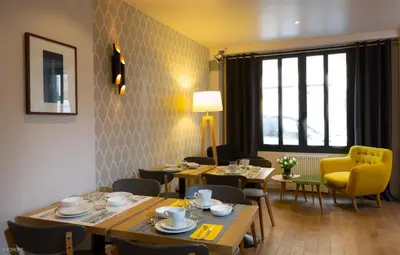 Coin salon dans l'établissement Hotel Mirabeau Eiffel