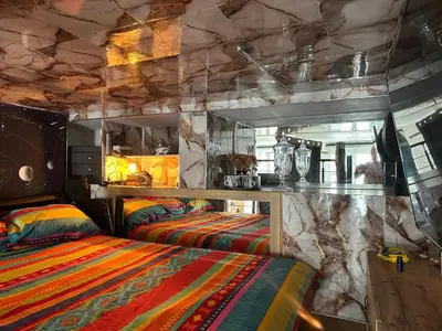 Un ou plusieurs lits dans un hébergement de l'établissement Magnifique studio au coeur du Marais
