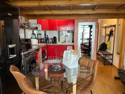 Cuisine ou kitchenette dans l'établissement Magnifique studio au coeur du Marais