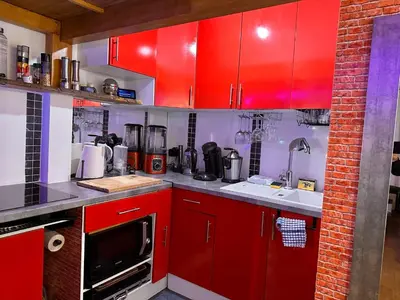 Cuisine ou kitchenette dans l'établissement Magnifique studio au coeur du Marais