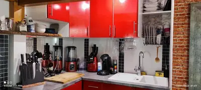 Cuisine ou kitchenette dans l'établissement Magnifique studio au coeur du Marais