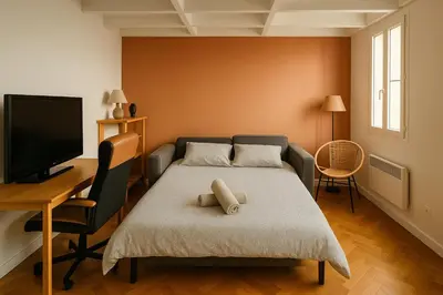 Un ou plusieurs lits dans un hébergement de l'établissement Home Sweet Home Champs Elysées Niel