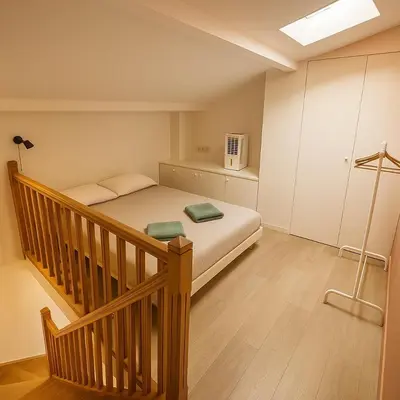 Un ou plusieurs lits dans un hébergement de l'établissement Home Sweet Home Champs Elysées Niel