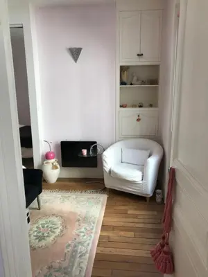 Un ou plusieurs lits dans un hébergement de l'établissement Superbe appartement proche de la butte Montmartre