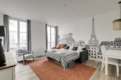 Coin salon dans l'établissement AC 4p apt - Louvres Place Vendome Paris center by Weekome