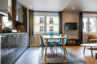Cuisine ou kitchenette dans l'établissement Les Appartements Cardinet