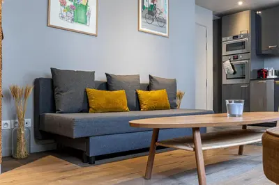 Cuisine ou kitchenette dans l'établissement Les Appartements Cardinet