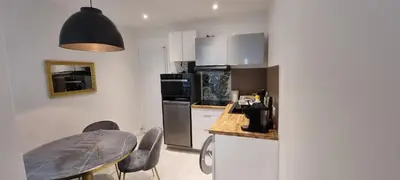Cuisine ou kitchenette dans l'établissement PARIS AURIOL