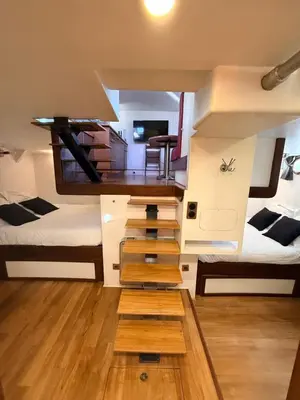 Un ou plusieurs lits dans un hébergement de l'établissement Cabine sur péniche à Bagatelle