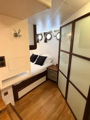 Un ou plusieurs lits dans un hébergement de l'établissement Cabine sur péniche à Bagatelle