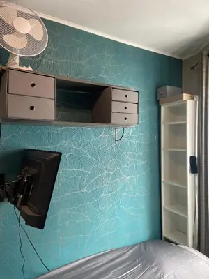 Un ou plusieurs lits dans un hébergement de l'établissement Cosy studio Paris 16 métro Exelmans