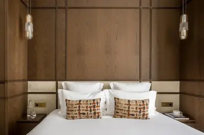 Un ou plusieurs lits dans un hébergement de l'établissement HIGHSTAY - Luxury Serviced Apartments - Louvre