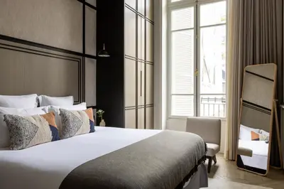 Un ou plusieurs lits dans un hébergement de l'établissement HIGHSTAY - Luxury Serviced Apartments - Louvre