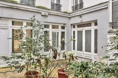 Jardin de l'établissement Beau T2 calme et moderne proche Grands Boulevards à Paris - Welkeys