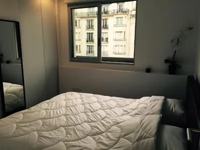 Un ou plusieurs lits dans un hébergement de l'établissement A deux pas des Champs Elysées