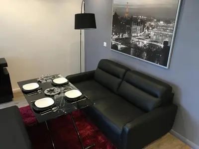 Coin salon dans l'établissement A deux pas des Champs Elysées