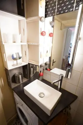 Cuisine ou kitchenette dans l'établissement Charmant studio au calme et bien desservi