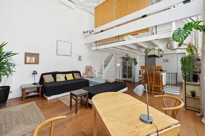 Coin salon dans l'établissement Le Montparnasse - Wifi - Climatisation