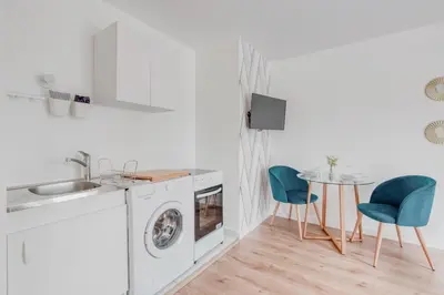 Cuisine ou kitchenette dans l'établissement L'élégant portes de Paris- Parking-5'RER B