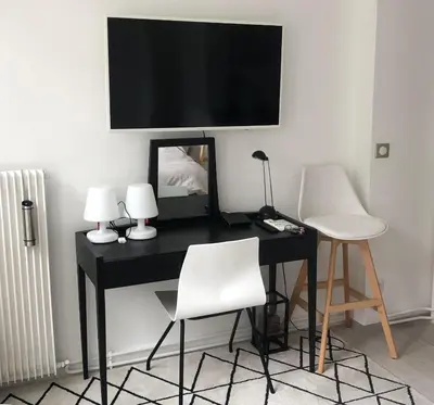 Télévision ou salle de divertissement dans l'établissement Cocoon Paris La Defense