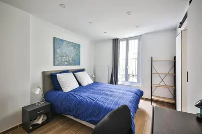 Un ou plusieurs lits dans un hébergement de l'établissement Le Nid de Montmartre